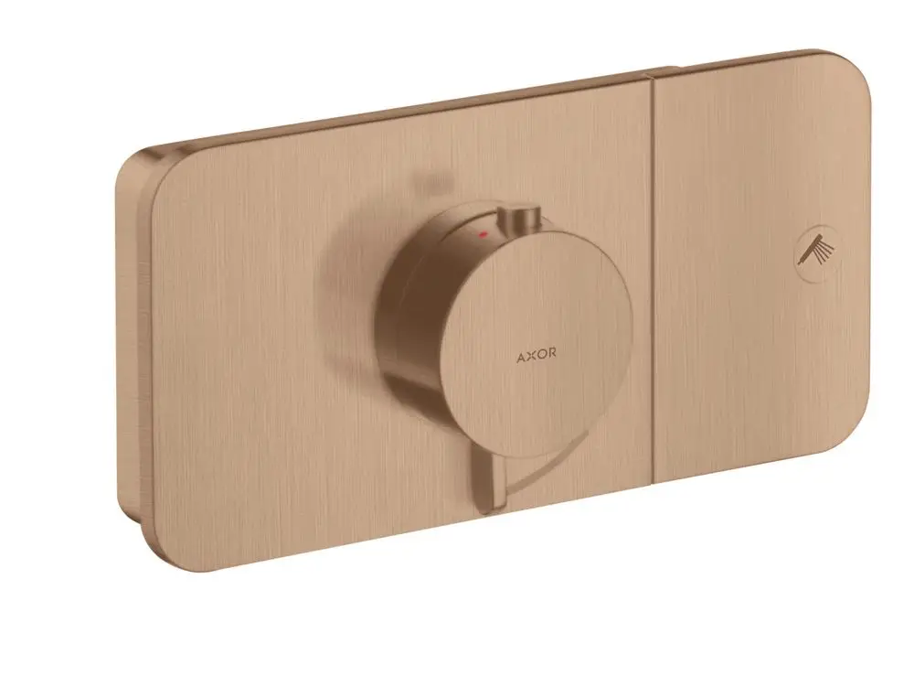 Thermostatmodul von AXOR in brushed red gold, flaches Design mit einem Drehknopf zur Steuerung und Symbol für Duschfunktion, installiert in Wandmontage.